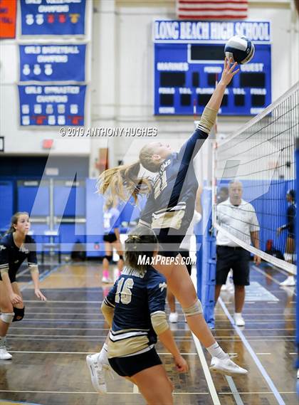 Thumbnail 1 in Mineola Vs Bayport Blue Point (Long Beach Invitational) photogallery.
