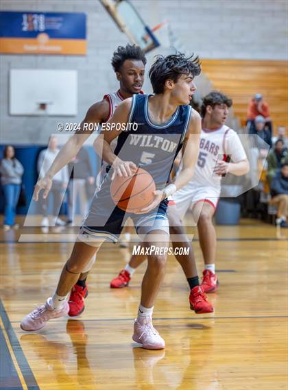 Thumbnail 1 in St. John The Baptist vs Wilton (New York Holiday Invitational) photogallery.
