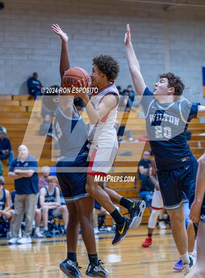 Thumbnail 2 in St. John The Baptist vs Wilton (New York Holiday Invitational) photogallery.