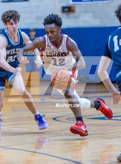 Thumbnail 1 in St. John The Baptist vs Wilton (New York Holiday Invitational) photogallery.
