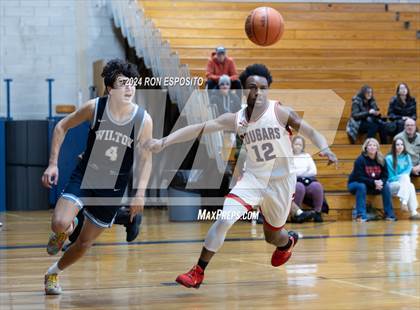 Thumbnail 2 in St. John The Baptist vs Wilton (New York Holiday Invitational) photogallery.