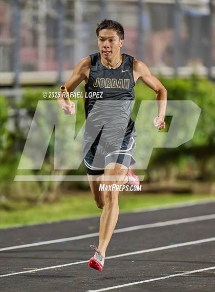 Thumbnail 2 in Dog Pound Invitational (4 x 400 Meter) photogallery.