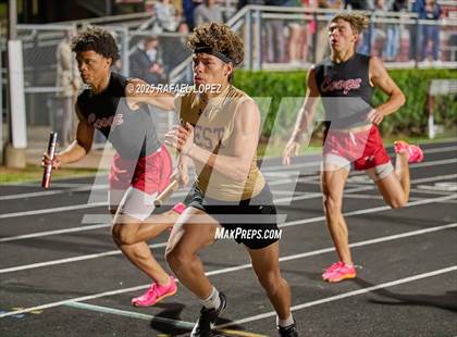 Thumbnail 1 in Dog Pound Invitational (4 x 400 Meter) photogallery.