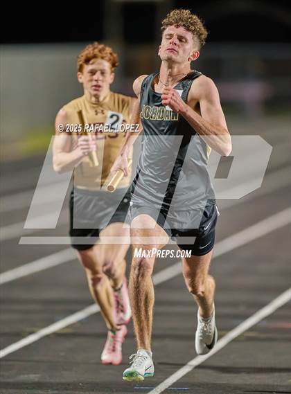 Thumbnail 1 in Dog Pound Invitational (4 x 400 Meter) photogallery.