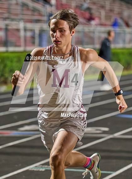 Thumbnail 2 in Dog Pound Invitational (4 x 400 Meter) photogallery.