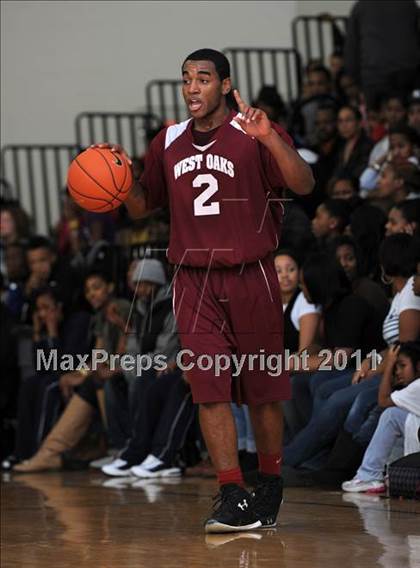 Thumbnail 2 in Christian Faith Center Academy vs. West Oaks (MLK Basketball Classic) photogallery.