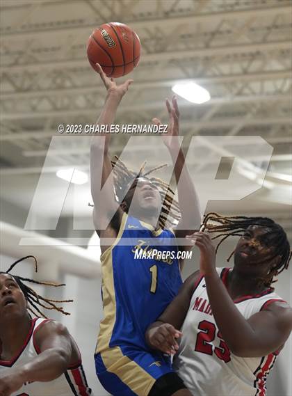 Thumbnail 2 in Hamshire-Fannett vs. Madisonville (Mike Dacus Classic) photogallery.