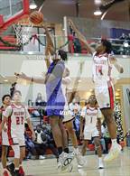 Photo from the gallery "Eagle Academy vs Half Hollow Hills East (Gary Charles Hoop Classic)"