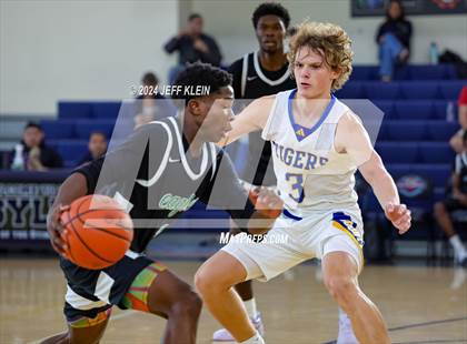 Thumbnail 2 in Divine Savior vs Martin County (Miami Holiday Invitational) photogallery.