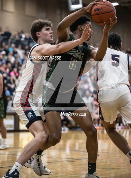 Thumbnail 3 in East Lansing vs. Ann Arbor Huron  (MHSAA Division 1 Quarter Final) photogallery.