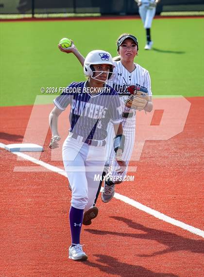 Thumbnail 2 in Guyer vs. Weslaco (UIL 6A Softball Semifinal) photogallery.