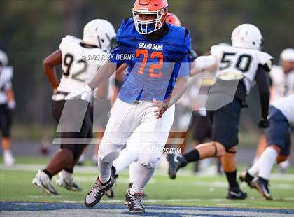 Thumbnail 1 in JV: Grand Oaks (blue) vs Conroe photogallery.