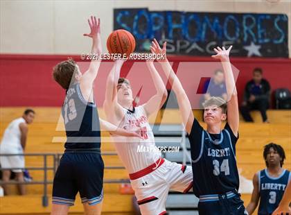 Thumbnail 1 in Hargrave vs Liberty Christian (2021 Chicken Express Holiday Extravaganza) photogallery.