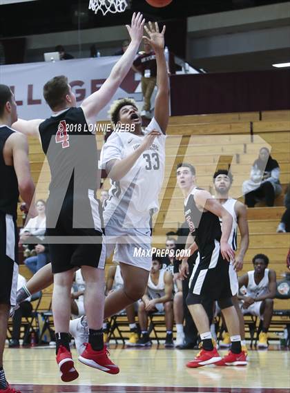 Thumbnail 3 in Woodstock Academy vs. St. Andrew's (Spalding Hoophall Classic) photogallery.