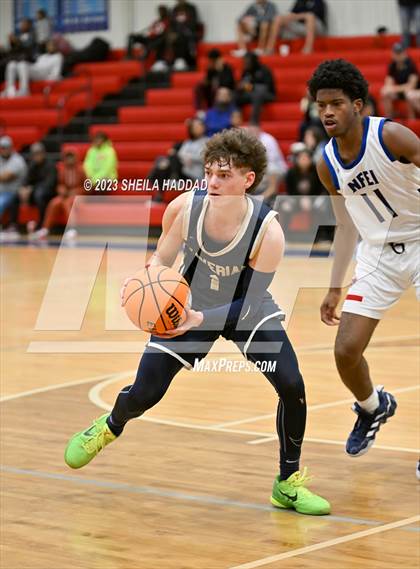 Thumbnail 3 in North Florida Educational Institute vs Xaverian  (Sun Bash Tourney) photogallery.