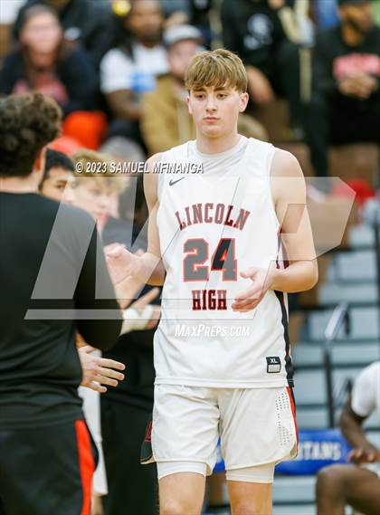 Thumbnail 1 in Lincoln Southeast vs. Lincoln High (HAC Tournament Final) photogallery.
