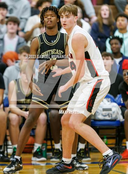 Thumbnail 1 in Lincoln Southeast vs. Lincoln High (HAC Tournament Final) photogallery.