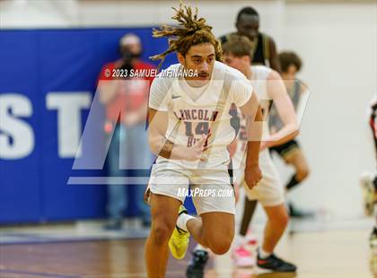 Thumbnail 3 in Lincoln Southeast vs. Lincoln High (HAC Tournament Final) photogallery.