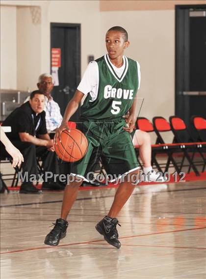 Thumbnail 1 in JV: Grove vs Central (MaxPreps Holiday Classic) photogallery.