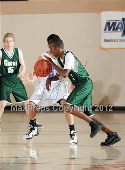 Thumbnail 3 in JV: Grove vs Central (MaxPreps Holiday Classic) photogallery.