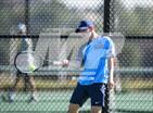 This MaxPreps.com professional photo is from the gallery University @ Riverdale Ridge which features Riverdale Ridge high school athletes playing  Tennis.