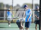 This MaxPreps.com professional photo is from the gallery University @ Riverdale Ridge which features Riverdale Ridge high school athletes playing  Tennis.