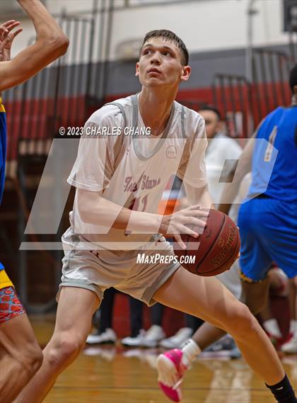 Thumbnail 3 in North vs. Bakersfield Christian (Russ Peterich Viking Tippoff Classic) photogallery.