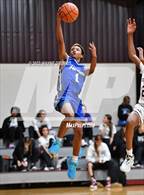 Photo from the gallery "Hooks vs. White Oak (Holiday Hoops Tournament)"