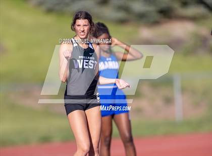 Thumbnail 2 in Metro Conference Track and Field Meet (4X100 Meter) photogallery.