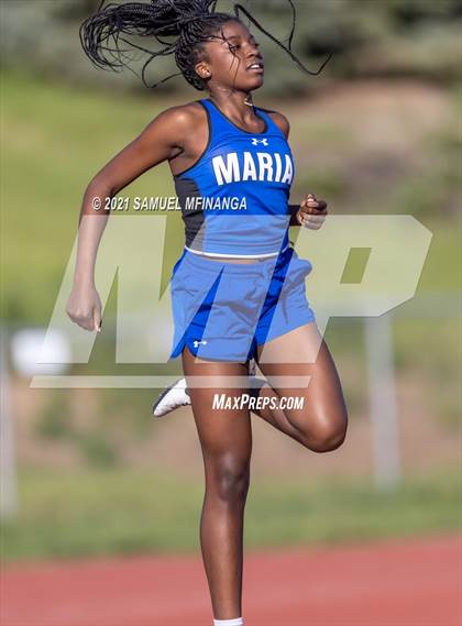 Thumbnail 2 in Metro Conference Track and Field Meet (4X100 Meter) photogallery.