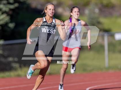 Thumbnail 3 in Metro Conference Track and Field Meet (4X100 Meter) photogallery.