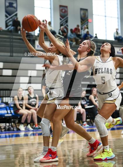 Thumbnail 2 in Helias vs Benton (Jefferson Bank Holiday Hoops) photogallery.