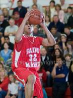 Dominique Lee on the way to the hoop for St. Mary's. 
