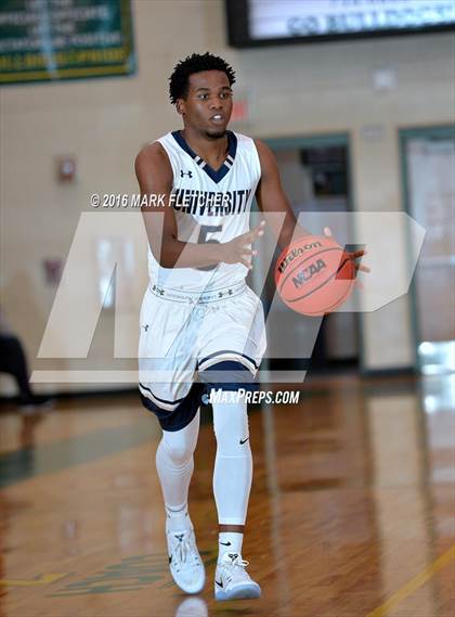 Thumbnail 1 in University vs Flagler Palm Coast (DeLand Holiday Tournament) photogallery.