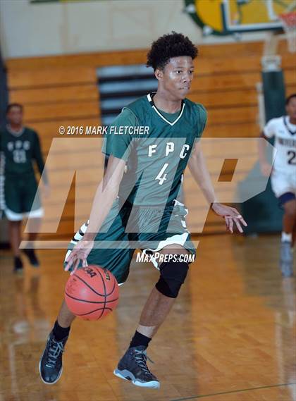 Thumbnail 1 in University vs Flagler Palm Coast (DeLand Holiday Tournament) photogallery.