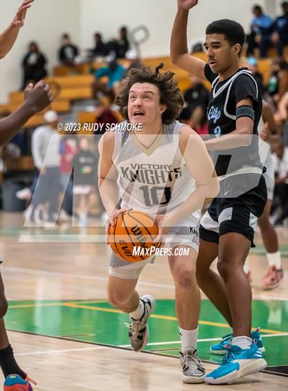 Thumbnail 3 in Victory Christian Academy vs. University City (MLK Showcase) photogallery.