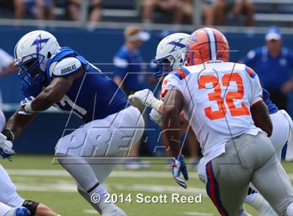 Thumbnail 1 in East St. Louis @ St. Xavier (2014 Crosstown Showdown) photogallery.
