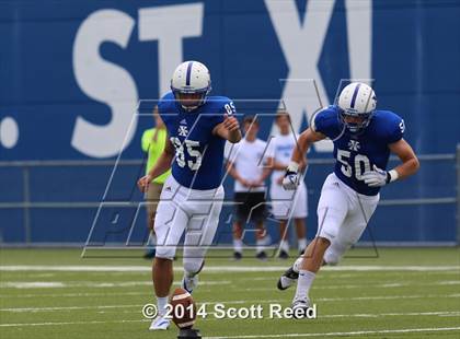Thumbnail 3 in East St. Louis @ St. Xavier (2014 Crosstown Showdown) photogallery.