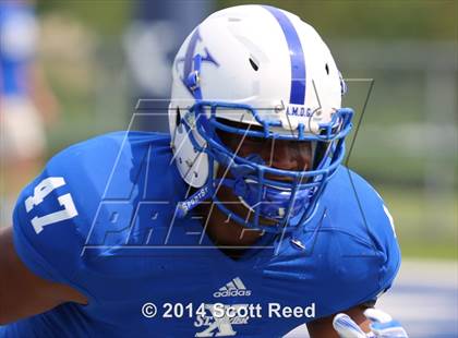 Thumbnail 1 in East St. Louis @ St. Xavier (2014 Crosstown Showdown) photogallery.