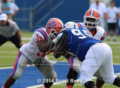 Thumbnail 1 in East St. Louis @ St. Xavier (2014 Crosstown Showdown) photogallery.