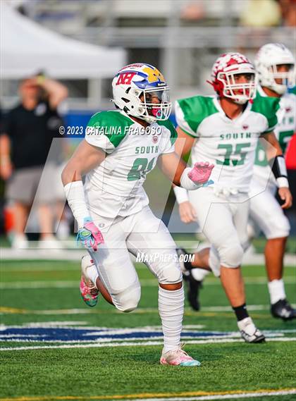 Thumbnail 3 in Phil Simms North vs South All Star Game photogallery.