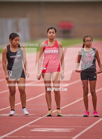 Thumbnail 3 in UIL 6A Track & Field District Finals (1600M) photogallery.