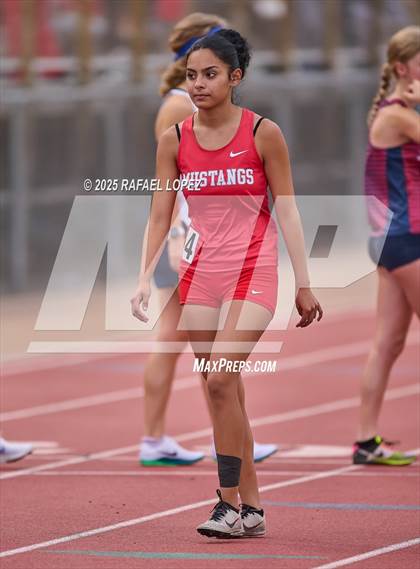 Thumbnail 1 in UIL 6A Track & Field District Finals (1600M) photogallery.