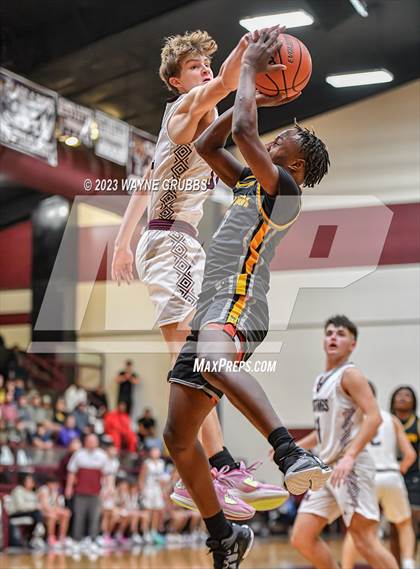 Thumbnail 2 in Martins Mill vs. Timpson (Holiday Hoops Tournament) photogallery.