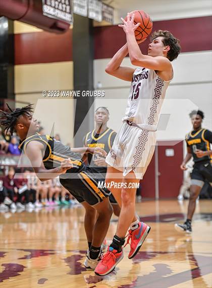 Thumbnail 2 in Martins Mill vs. Timpson (Holiday Hoops Tournament) photogallery.