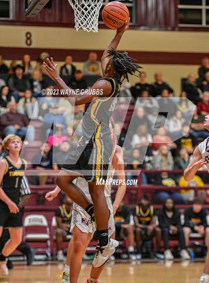 Thumbnail 2 in Martins Mill vs. Timpson (Holiday Hoops Tournament) photogallery.