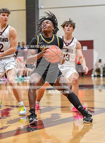 Thumbnail 3 in Martins Mill vs. Timpson (Holiday Hoops Tournament) photogallery.