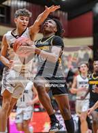 Photo from the gallery "Martins Mill vs. Timpson (Holiday Hoops Tournament)"