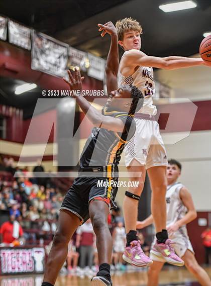 Thumbnail 1 in Martins Mill vs. Timpson (Holiday Hoops Tournament) photogallery.