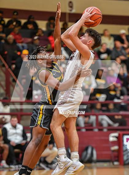 Thumbnail 1 in Martins Mill vs. Timpson (Holiday Hoops Tournament) photogallery.